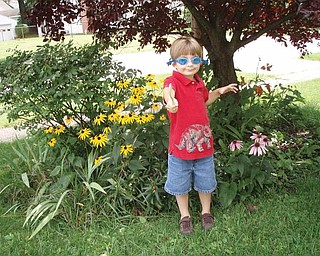 Thomas Hull III, 4, and his parents, Larisa and Thomas Hull of Ann Arbor, Mich., spent time this summer visiting his baba, Irene Piwtorak, on the West Side of Youngstown.