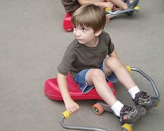 While visiting in Youngstown this summer, Thomas Hull III, 4, and his parents, Larisa and Thomas Hull of Ann Arbor, Mich., spent time at the Pittsburgh Zoo.