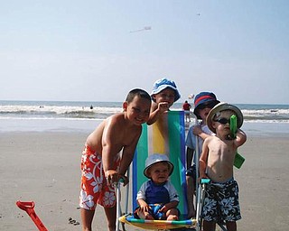 The Carcelli family vacationed in North Myrtle Beach. From left are Dominic and Ryan Carcelli of New Middletown, Gino Carcelli of Ravenna, and Nicholas and Tyler (sitting) Carcelli of (Mayfield Heights.