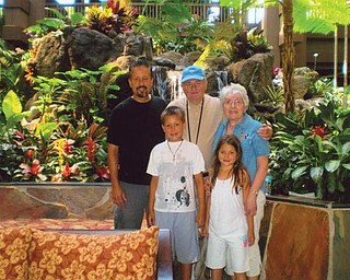 Jerry and Maryann Jurcisin of Coitsville Township celebrated their 50th wedding anniversary May 9 at Disney World in Florida with their son, Mark Yurcisin, and grandchildren, Andrew, 9 and Elizabeth, 8, of Reno, Nev.