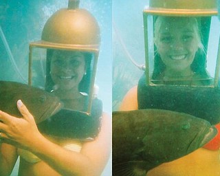 Sommer Fasulo, left, and Corrie Romesburg took time out to do some helmet diving to swim with the groupers during their recent trip to Bermuda in July for Sommer's wedding to Spencer Conway. Sommer is a granddaughter of Doris Jean Chianello of Coitsville and a great-niece of Darlene Romesburg of Struthers. Corrie is a freshman at Youngstown State University.
