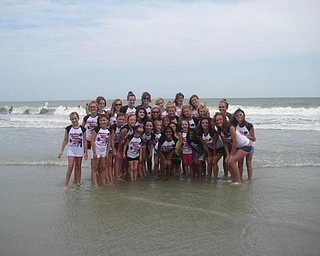 Members of Jamie's Dance Force Competition Team were in Myrtle Beach in July. They took time out from competing at the Starpower National Talent Competition to make some memories on the beach. Studio owner and director Jamie Cordon is in the center of the back row.