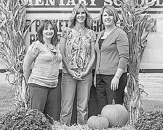 Special to The Vindicator
HARVEST SPECIAL: Among those who have completed arrangements for a fall festival, which will benefit Lloyd Elemenatary School and its students, are, from left, Jenn Kluchar, committee cochair; Kelly Constance, festival chair; and Kim Smrek, committee member.