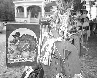 FALL FEST: Crafts are on display, at left, outside a booth by D&J’s Unique Designs at Boardman Township Park. Boardman Rotary’s Oktoberfest began Saturday and continues today. 