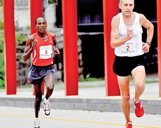 The Vindicator/Dan Shieldson Spring Commons Bridge as Matt Folk begins to move aheadfor the finish of the Peace Race. 