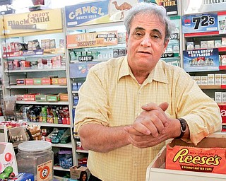 STORE OWNER: Jihad Mahd, owner of Big Apple Convenient Mart on Youngstown Road, Warren, said there may have been more than 100 people in the area of his store when the shooting occurred early
Saturday.
