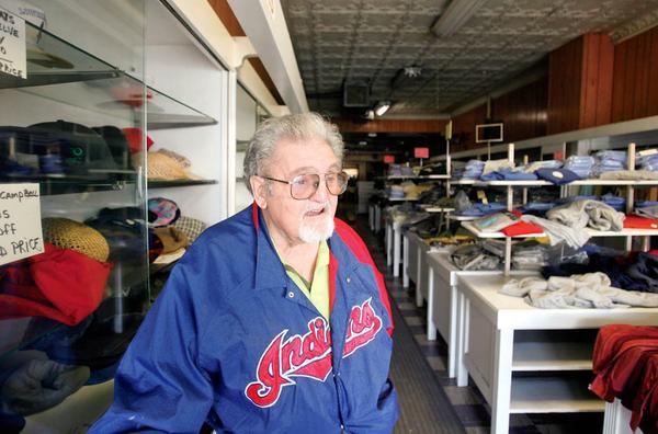 MEMORIES: Nick Noviello shares some of his memories in the  Bridge Street store in Struthers where he’s worked for 60 years. The store and its inventory will be auctioned Thursday.