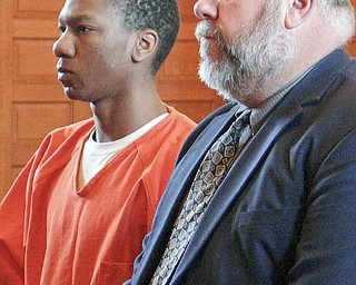 LIFE IN PRISON: Eugene Cumberbatch appeared in Trumbull County Common Pleas Court with his attorney, Joseph Fritz, to be sentenced for his role in the April 13 deaths of Lloyd McCoy Jr., 11, and Marvin Chaney, 26. Cumberbatch was sentenced to life in prison with parole eligibility after 38 years.