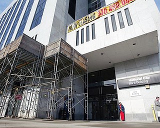 RENOVATIONS: Scaffolding is set up outside the National City building in downtown Youngstown. National City Bank was bought out by PNC Bank last year, and the building’s signage is scheduled to be replaced in the coming months.