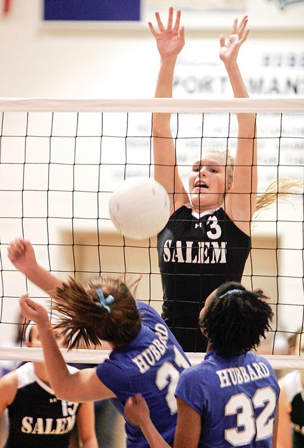 Salem's Olivia Mitchley blocks a shot by Hubbard's Jillian hinkle#21 at right is Hubard's Jackie Carlisle. wdlewis