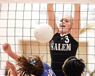 Salem's Olivia Mitchley blocks a shot by Hubbard's Jillian hinkle#21 at right is Hubard's Jackie Carlisle. wdlewis