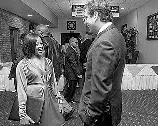 Meredith Lilly speaks with congressman Tim Ryan at the Mahoning County Country Club prior to the 90th NAACP Banquet on Friday evening.