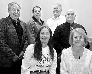 DRUMMING UP SUPPORT: Involved in planning a charity concert to benefit the Rescue Mission of Mahoning Valley and Angels for Animals on Oct. 18 at Stambaugh Auditorium are, standing from left, former Sen. Harry Meshel; Ron Chick, whose 22-piece All Star Alumni Big Band will be featured; and Jim Echement and the Rev. David L. Sherrard of the Rescue Mission; and, seated from left, Diane Less, co-founder of Angels for Animals, and Ruth McMonagle, event sponsor.