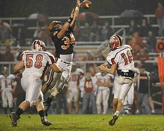 Springfield's (34) Dylan DeJane  blocks Columbiana QB Austin Barbato's pass on Friday night. Photo/Mark Stahl