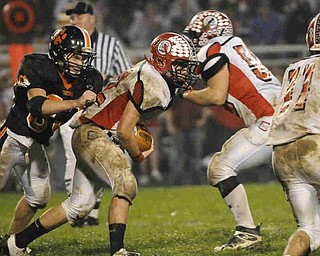 Columbiana's RB (22) Nick MacMillan gets some tough yards against Sprinfield during their game on Friday night. Photo/Mark Stahl