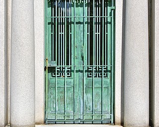 Columns, gated entrances adorn some of the mausoleums and vaults