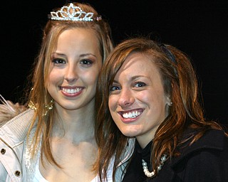 "South Range Homecoming Queen Carly Fusco and Senior Attendant
Dominique Bishop pose for photos after the ceremony."
