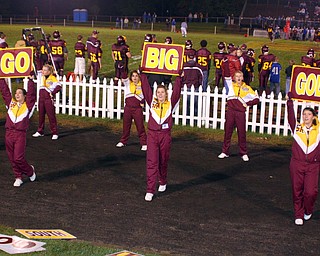 "Go Big Gold" say the South Range cheerleaders on the sideline.