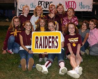 "Little Raiders cheerleaders and friends are ready to cheer on the
South Range team."
