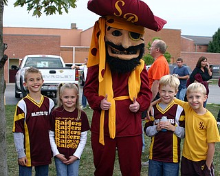 "Little Raiders cheerleaders and friends are ready to cheer on the
South Range team."
