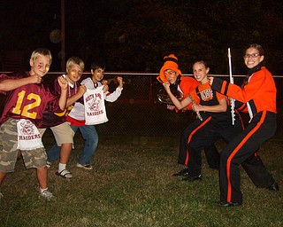 
The Rivalry of the Cousins: Cousins from Springfield and South Range battle it off at the South Range-Springfield game. On the left: Neil Buzzacco, Mario Buzzacco, and Dominic Joseph. On the right: Angela Buzzacco, Olivia Buzzacco, and Anthony Buzzacco.
