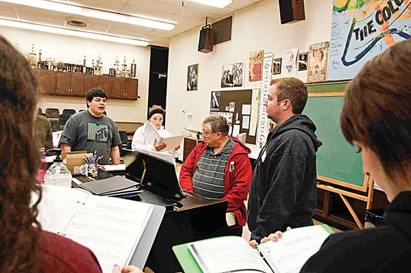 PRACTICE MAKES PERFECT: From left, Tyler Moliterno, Katelyn Deladurantey, Errol Kehrberg and David Mullane prepare for the Boardman Drama Guild’s fall musical production. The group practices several days each week in the months leading up to the production.