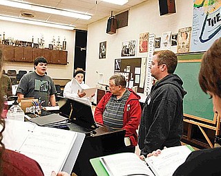 PRACTICE MAKES PERFECT: From left, Tyler Moliterno, Katelyn Deladurantey, Errol Kehrberg and David Mullane prepare for the Boardman Drama Guild’s fall musical production. The group practices several days each week in the months leading up to the production.