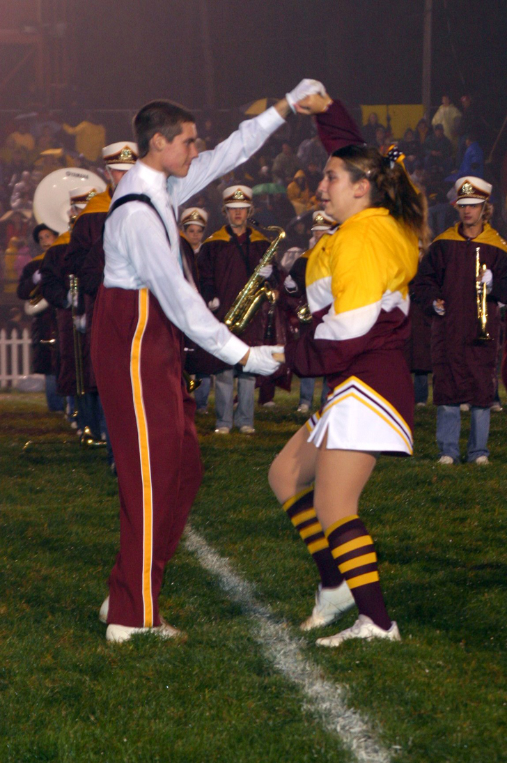 "Senior band members Ethan Parks and Brittany Haynes dance to "Zoot
Suit Review" during the halftime show at the South Range football
game."