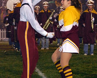 "Senior band members Ethan Parks and Brittany Haynes dance to "Zoot
Suit Review" during the halftime show at the South Range football
game."
