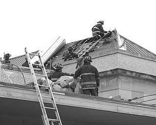 ON THE ROOF: Firefighters spent a couple of hours putting out a fire in the roof of the Warren post office on High Street Northeast that started at 3:20 p.m. Monday. Water used to put out the fire did some interior damage to the building. Workers using torches on the post office roof started the fire, the fire department said. The post office was closed Monday for Columbus Day.
