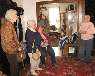 Special to The Vindicator
tourists: Austintown Homemakers visited the historic McBride House at 27 Hager St., Hubbard, during a recent open house. They were welcomed by, at right, Cecilia Cooper, president of Hubbard Historical Society, who provided a guided tour of the home. Guests may tour the McBride House from 2 to 5 p.m. on the second Sunday of each month, or make special arrangements by calling the president at (330) 534-4247. 