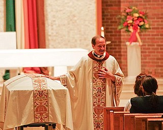 EULOGY: Monsignor Peter Polando delivers the eulogy for Capt. Ken Centorame, the Youngstown Police Department officer who died of leukemia Saturday. Monsignor Polando talked about Centorame’s faith and family at services Thursday at St. Matthias Church in Youngstown.