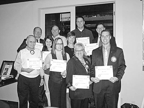 Special to The Vindicator
HONORED: Members of the Rotary Club of Austintown who have achieved perfect attendance records during the first quarter of the year were honored at the club’s meeting on Oct. 19 at the Saxon Club on Meridian Road. Displaying their attendance certificates are, from left, bottom row, Tony Cebriak, Rachel Solida, Robin Stock and Brian Laraway, club president; middle row, Deanna Spirko and Hillary Prestridge; and top row, Chuck Baker, Gary Reel, Brian Frederick and Dr. Mitch Dalvin. “Why Diets Don’t Work” was the theme of Butch Temnick, who spoke at the meeting and encouraged members to get their weight and blood pressure under control by eating healthful foods.