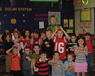 The Green Team provided pumpkins to paint for students in Mrs. Sheehan's kindergarten class at Springfield Elementary School.                               