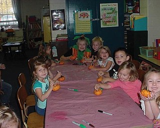 The Green Team's pumpkin recycling lesson was presented to these students in Canfield Presbyterian Church Weekday Preschool's morning class.                               