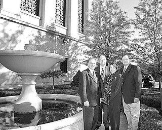 The Vindicator/Robert K. Yosay
HELPING OTHERS: For years, the Monday Musical Club has been organizing collection events to benefit the Rescue Mission of the Mahoning Valley. Some of those involved in the effort are, left to right, Monday Musical board members Richard Esposito, president; Walter DeBald; and Joan Gallitto, secretary; and Don Rosa, Rescue Mission board president.