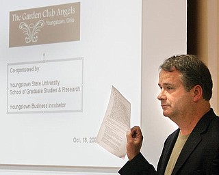 Pat Gaughan, YSU Business Community Laison conducts a meeting of The Garden Cub Angels Monday 10-19-09 at the Youngsotwn Business Incubator. wd lewis