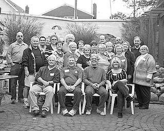 Special to The Vindicator
REUNITED: On Oct. 3, The David Anderson High School Class of 1969, of Lisbon, had an impromptu gathering to celebrate the 40th anniversary of their graduation. The event, which took place at Mark’s Landing at Guilford Lake, was a casual afternoon gathering. It was organized by Mary Beth Boso, Sarah Nicholson Haines and Saunie Pickens Hall. The class had 99 graduates. Twenty-four of them were able to attend the reunion. From left to right, seated, are Gary Haney, Curt Bacon, Dave Hughes and Saunie Pickens Hall. In the second row are Janette Buckley Pettigrew, Mary Kennedy Melhorn, Mary Ann Belaney Burton, Mary Beth Boso, and Carol Lewton Deichler. In the third row are Greg Hall, Sarah Nicholson Haines, Bill Pahanish, Bunny Ieropoli, Cathy Sinsley Nicholson, Melinda Loch Belaney, Betsy Blocksom Barringer, and Alana Bittner. Rounding out the alumni, in the fourth row, are Lee McMillan, Randy Muntean, Dave Belaney, Allan Neel, Jim Crosser, Bud Martin, and Harry Fowler.