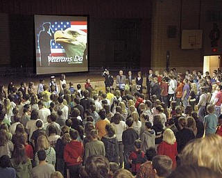 The Vindicator/Robert K. Yosay --- A A salute to veterans as the Canfield Middle School students - interviewed veterans and told their stories. They also had a speaker who was once a student there as the main speaker YPD officer William Ward and former Marine 11/11/2009