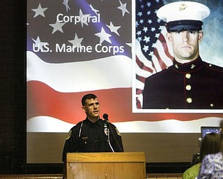The Vindicator/Robert K. Yosay --- A A salute to veterans as the Canfield Middle School students - interviewed veterans and told their stories. They also had a speaker who was once a student there as the main speaker YPD officer William Ward and former Marine 11/11/2009