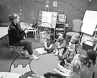 Special to The Vindicator
‘G’ is for ghost! Some of Mrs. Hamrock’s eighth-graders visited the morning and afternoon preschool classes at St. Patrick School in Hubbard recently. Since Halloween was on the way, the students read Halloween stories and made ghosts for the preschoolers to take home. The eighth-grade class participates in St. Patrick’s preschool reading program. Throughout the school year, students visit local preschools to read holiday stories and do a craft project with the children.