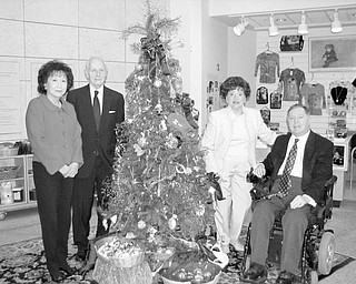 Special to The Vindicator
READY for holidays: Looking forward to the upcoming holiday season after completing arrangements for the 39th annual American Holiday Fine Arts and Crafts Show and Sale at the Butler Institute of American Art are, from left, Florence Wang, chairwoman, and C. Gilbert James, Camilla Geordan, and John MacIntosh, co-chairs. Completing the holiday show committee as a co-chair but not pictured is John Grdic.
