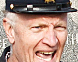 RECALLING THEIR LIVES: Capt. David Frank, a member of the 19th Ohio Company B regiment, talks about the lives of the deceased soldiers.