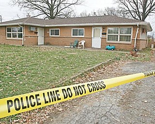 SHOOTING SCENE: This is the home at 3022 Northgate Drive, Liberty Township, where a woman and a female juvenile were found shot to death late Sunday. The names of the victims were not released Monday. 