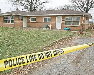 SHOOTING SCENE: This is the home at 3022 Northgate Drive, Liberty Township, where a woman and a female juvenile were found shot to death late Sunday. The names of the victims were not released Monday.