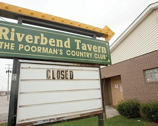 NO TRESPASSING: The Riverbend Tavern, 1105 Poland Ave., Youngstown, will remain boarded up for at least 30 more days and possibly as long as a year. It was raided Nov. 5 on suspicion of drug trafficking and illegal gambling.