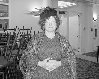 Special to The Vindicator
OLD STYLE: The Friends of Austintown Library were given a glimpse of what was stylish to wear in the 1800s when the speaker, Deborah Wagner, made her appearance in vintage clothing. She showed several examples of fashions from that era and explained the hidden meaning of the designs on early quilts. The Austintown High School Choir will perform at the 10 a.m. Dec. 21 meeting of the Friends. Guests interested in attending the meeting are asked to make reservations for the $8 catered luncheon.