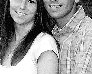 Ashley Fristik and Travis J. Parker