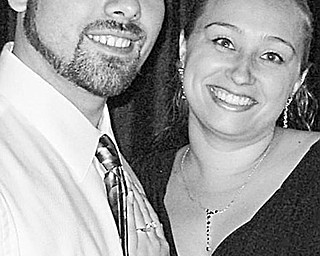 Justin Woods and Genevieve Leeworthy                      