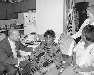 Special to The Vindicator
INFORMATIVE VISIT: Ohio State Sen. Joseph Schiavoni had an opportunity to check how home-care services are meeting the health needs of individuals and saving taxpayers as he visited with 86-year-old Fannie Tubuner on Nov. 16 at her home in Youngstown. She explained she has arthritis, diabetes and a heart condition and receives assistance through the PASSPORT program five days a week. Helping her and providing companionship are, seated at right, Monissa Redmond, home health aide, and standing, Darla Renner, director of nursing, both with Cambridge Home Health Care. The average cost of in-home care is $12,600 a year, and it would be more than $55,000 in a nursing home.